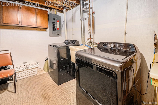 9300 Clippert St, Taylor, MI 48180 - laundry room featuring electric panel, cabinet space, and washing machine and clothes dryer