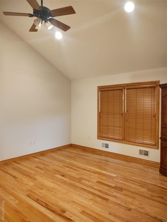 8996 Main St, Whitmore Lake, MI 48189 - empty room featuring vaulted ceiling, light wood-style floors, recessed lighting, and ceiling fan