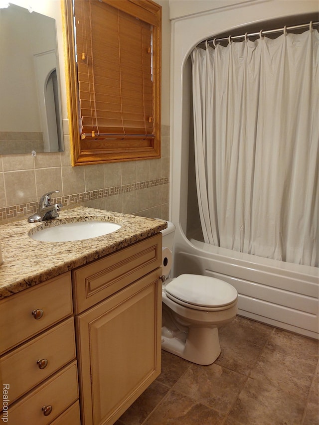 8996 Main St, Whitmore Lake, MI 48189 - full bath featuring vanity, shower / bath combo, and decorative backsplash