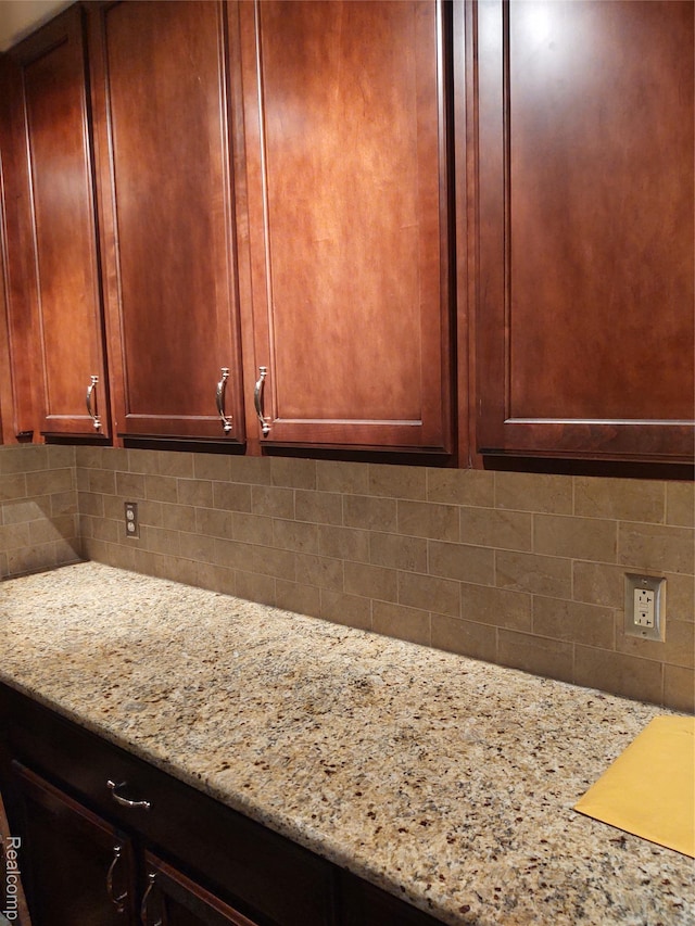 8996 Main St, Whitmore Lake, MI 48189 - detailed view of backsplash and light stone countertops
