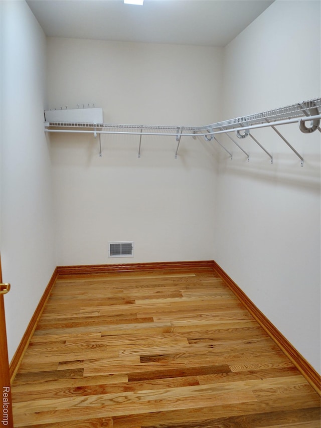 8996 Main St, Whitmore Lake, MI 48189 - spacious closet featuring light wood finished floors