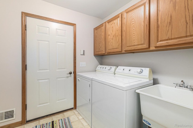 6144 Northridge Hills Dr, Brighton, MI 48116 - washroom featuring washer and dryer and cabinet space