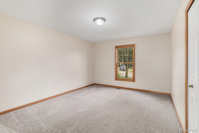 6144 Northridge Hills Dr, Brighton, MI 48116 - carpeted empty room featuring baseboards