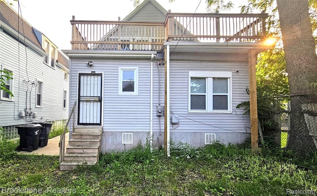 2520 Seyburn St, Detroit, MI 48214 - rear view of property featuring entry steps, a balcony, and crawl space