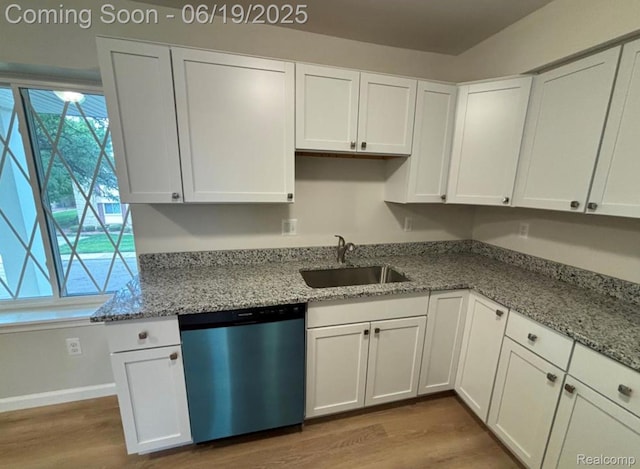 29264 Gloede Dr, Warren, MI 48088 - kitchen with dishwashing machine, wood finished floors, white cabinets, and light stone countertops
