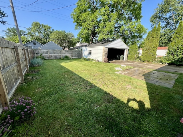 22026 Alger St, Saint Clair Shores, MI 48080 - fenced backyard with a detached garage and an outdoor structure
