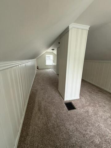 22026 Alger St, Saint Clair Shores, MI 48080 - bonus room with vaulted ceiling, carpet flooring, and a decorative wall