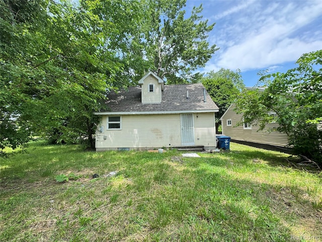 26439 Hopkins St, Dearborn, MI 48141 - rear view of house featuring roof with shingles