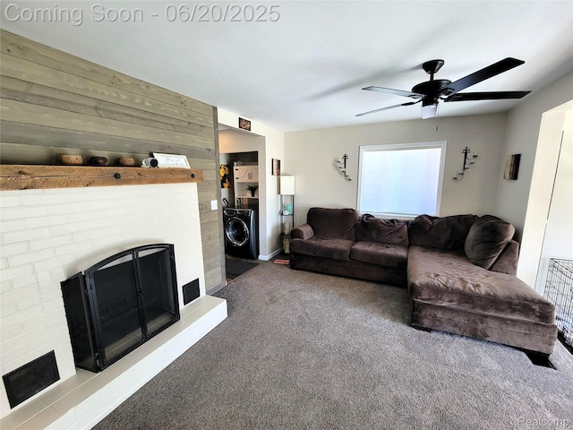 11329 E Shore Dr, Whitmore Lake, MI 48189 - living area featuring a brick fireplace, carpet, ceiling fan, and washer / dryer