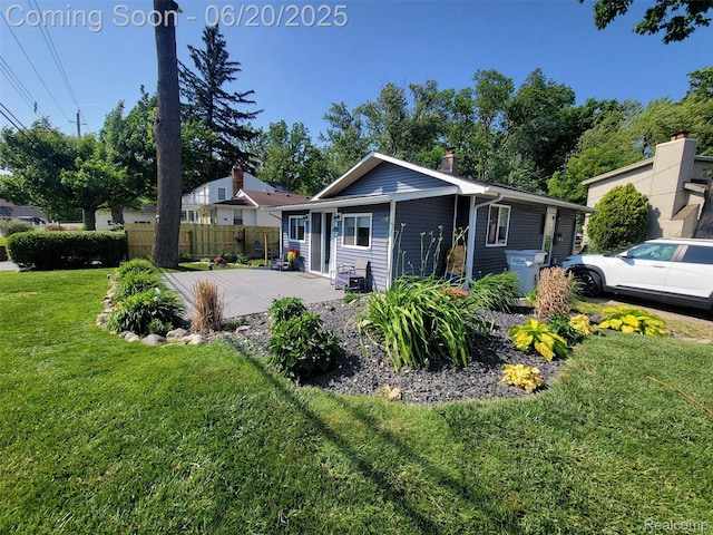 11329 E Shore Dr, Whitmore Lake, MI 48189 - view of front of house with a chimney