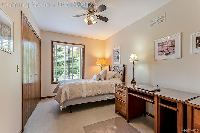 24320 Simmons Dr, Novi, MI 48374 - bedroom with light carpet, a closet, and a desk