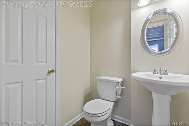 17922 Wingate Dr, Macomb, MI 48042 - half bath with toilet and baseboards