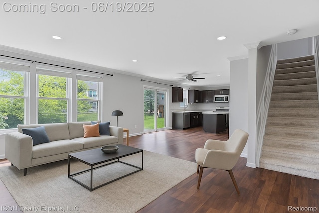 17922 Wingate Dr, Macomb, MI 48042 - living area with recessed lighting, stairway, dark wood-style flooring, crown molding, and a ceiling fan