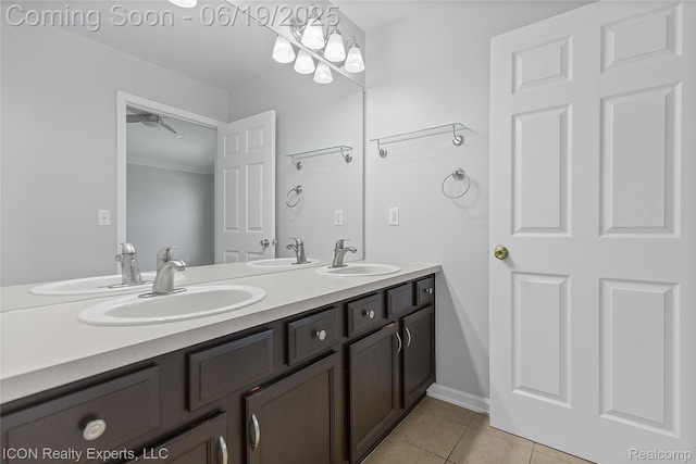 17922 Wingate Dr, Macomb, MI 48042 - bathroom with tile patterned floors, double vanity, a ceiling fan, and ornamental molding