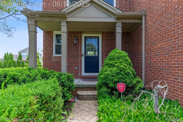 17922 Wingate Dr, Macomb, MI 48042 - view of exterior entry with brick siding