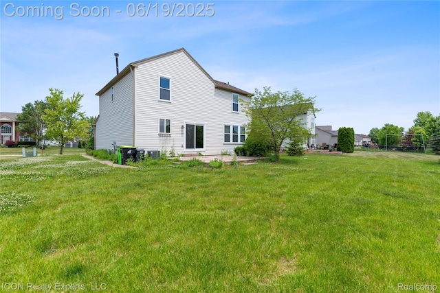 17922 Wingate Dr, Macomb, MI 48042 - rear view of property with a yard and a patio