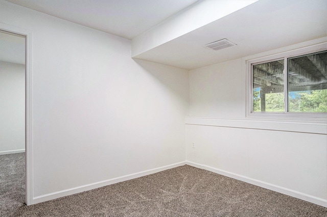 2502 Thorn Creek St SE, Kentwood, MI 49508 - spare room featuring carpet floors and baseboards