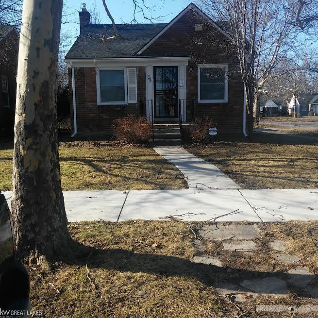 9327 Camley St, Detroit, MI 48224 - bungalow-style house featuring brick siding and a chimney
