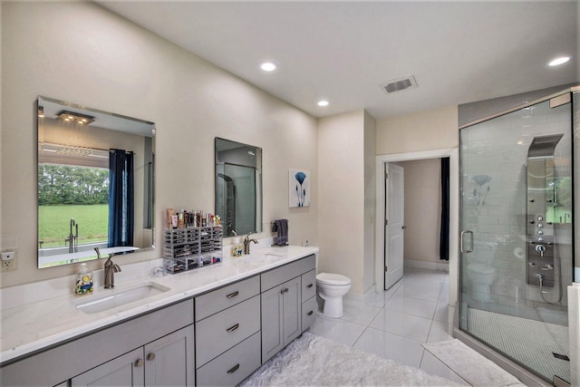 68363 Calvin Center Rd, Cassopolis, MI 49031 - full bathroom featuring double vanity, a shower stall, tile patterned floors, and recessed lighting
