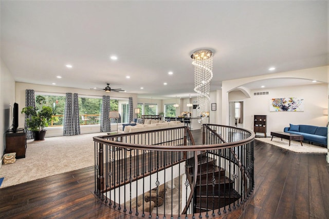 68363 Calvin Center Rd, Cassopolis, MI 49031 - staircase with hardwood / wood-style flooring, recessed lighting, a chandelier, arched walkways, and ceiling fan