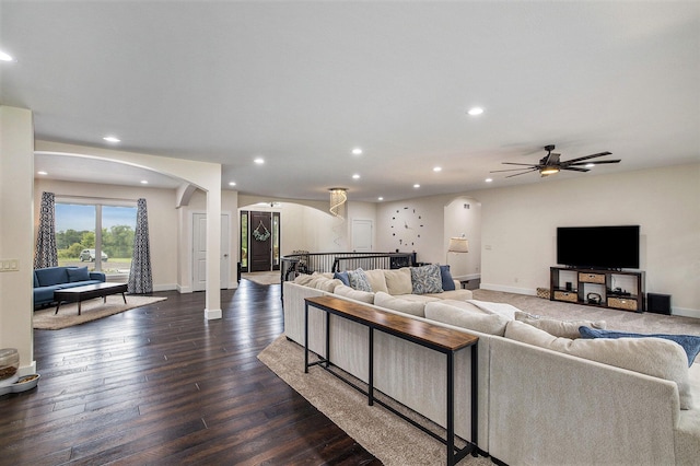 68363 Calvin Center Rd, Cassopolis, MI 49031 - living area with arched walkways, recessed lighting, dark wood finished floors, and a ceiling fan