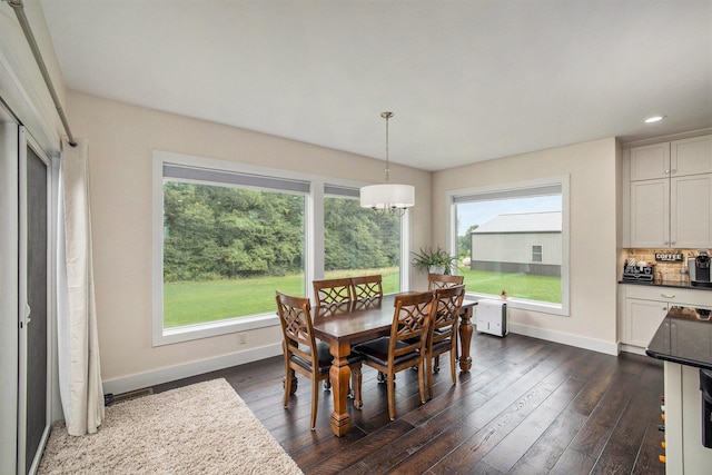 68363 Calvin Center Rd, Cassopolis, MI 49031 - dining room featuring a chandelier, dark wood-type flooring, and recessed lighting