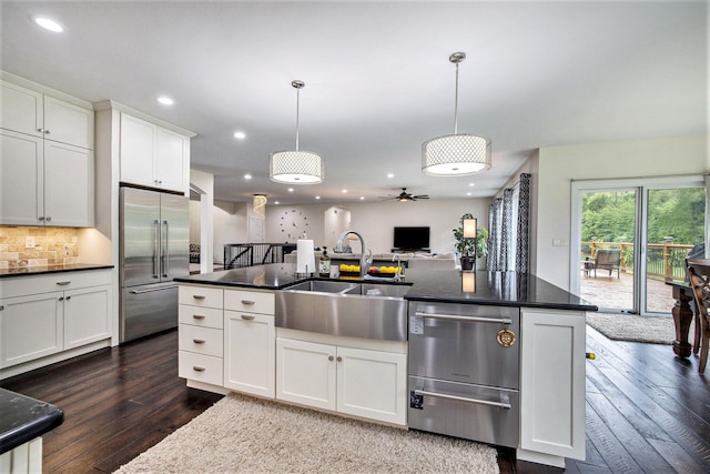 68363 Calvin Center Rd, Cassopolis, MI 49031 - kitchen with stainless steel built in fridge, dark wood-type flooring, recessed lighting, ceiling fan, and white cabinetry