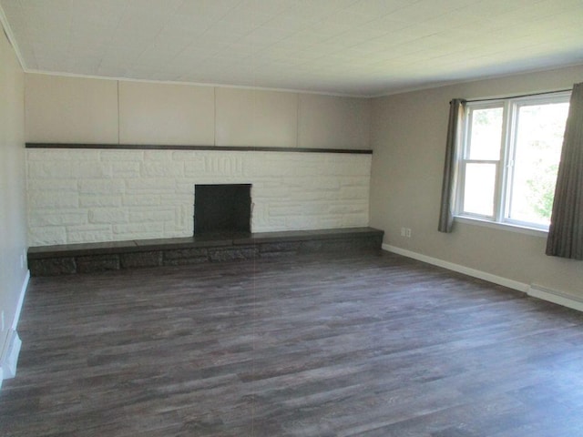 307 John St, Colon, MI 49040 - unfurnished living room with wood finished floors, ornamental molding, and a fireplace