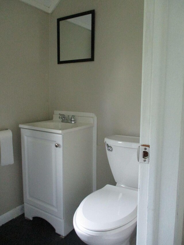 307 John St, Colon, MI 49040 - half bathroom featuring toilet and vanity