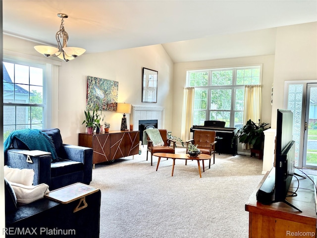 5089 Northfield Dr, Howell, MI 48843 - living room with carpet, plenty of natural light, and lofted ceiling