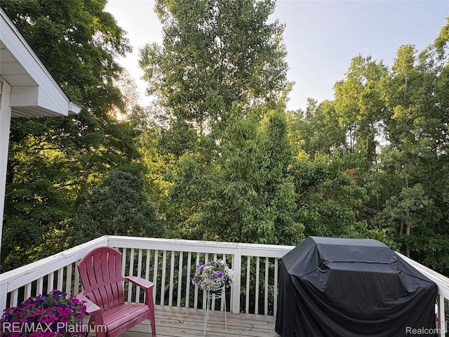 5089 Northfield Dr, Howell, MI 48843 - wooden terrace featuring a grill