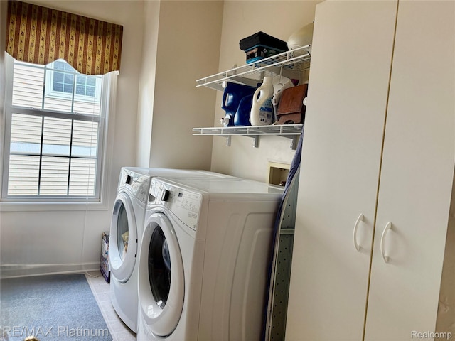 5089 Northfield Dr, Howell, MI 48843 - washroom with washer and clothes dryer and light carpet