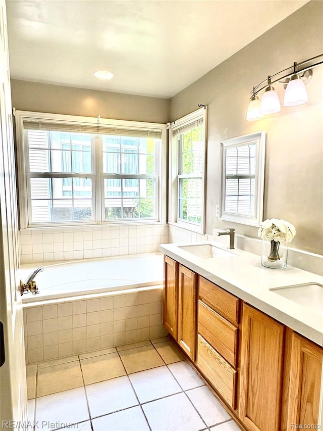 5089 Northfield Dr, Howell, MI 48843 - full bathroom featuring a garden tub, tile patterned floors, and double vanity