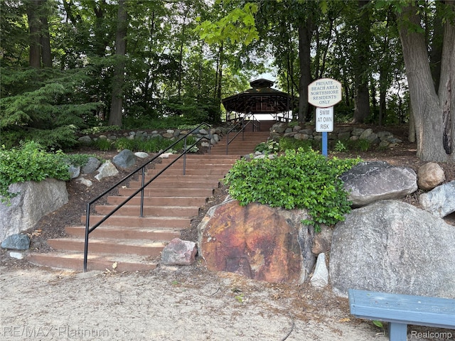 5089 Northfield Dr, Howell, MI 48843 - view of home's community featuring a gazebo and stairway