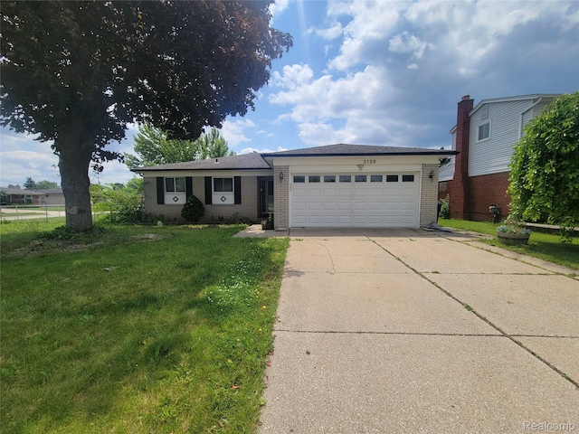 3136 Alden Dr, Sterling Heights, MI 48310 - ranch-style house featuring brick siding, a garage, concrete driveway, and a front lawn