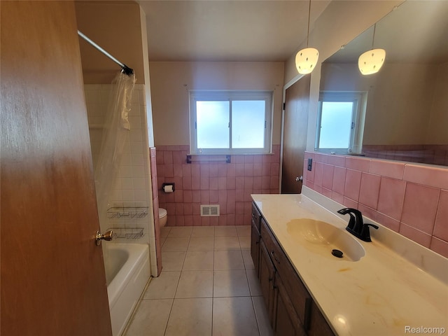 3136 Alden Dr, Sterling Heights, MI 48310 - full bath featuring tile walls, tile patterned flooring, vanity, wainscoting, and shower / bathtub combination with curtain