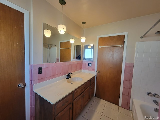 3136 Alden Dr, Sterling Heights, MI 48310 - bathroom featuring tile patterned floors, vanity, tile walls, and bathtub / shower combination