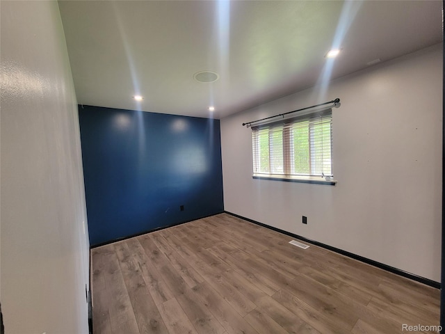 3136 Alden Dr, Sterling Heights, MI 48310 - unfurnished room with wood finished floors and baseboards