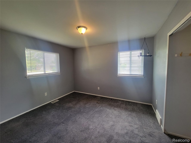 3136 Alden Dr, Sterling Heights, MI 48310 - spare room with dark colored carpet
