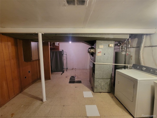3136 Alden Dr, Sterling Heights, MI 48310 - finished below grade area with washer / clothes dryer, water heater, light flooring, wooden walls, and heating unit