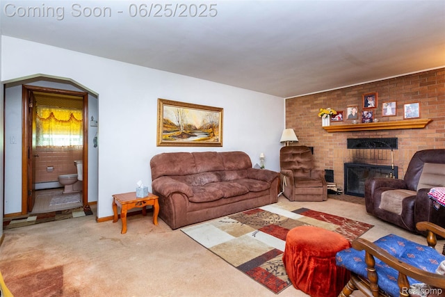 4144 Hillcrest Dr, Warren, MI 48092 - living area with carpet floors, a fireplace, a baseboard radiator, and arched walkways