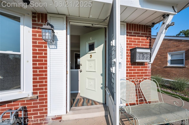 6622 Schaller St, Garden City, MI 48135 - property entrance with brick siding and covered porch