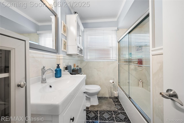 6622 Schaller St, Garden City, MI 48135 - bathroom featuring vanity, crown molding, and bath / shower combo with glass door