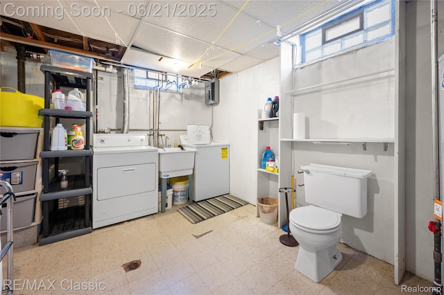 6622 Schaller St, Garden City, MI 48135 - below grade area featuring washer and dryer and tile patterned floors