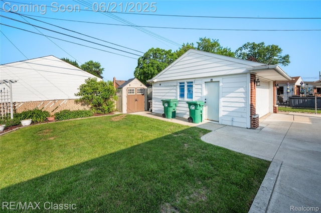 6622 Schaller St, Garden City, MI 48135 - view of yard featuring an outdoor structure and concrete driveway