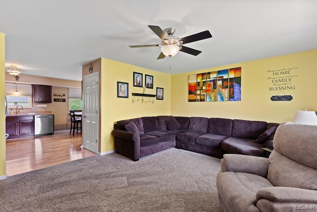 3564 Sapphire Dr, Adrian, MI 49221 - living room with light carpet, ceiling fan, and light wood finished floors