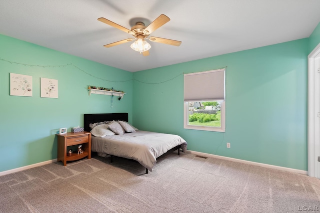 3564 Sapphire Dr, Adrian, MI 49221 - carpeted bedroom with ceiling fan and baseboards