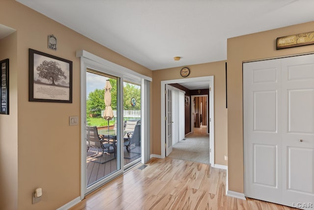 3564 Sapphire Dr, Adrian, MI 49221 - foyer entrance featuring light wood-style flooring and baseboards