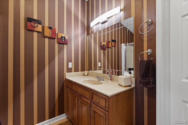 3564 Sapphire Dr, Adrian, MI 49221 - bathroom featuring vanity and wallpapered walls