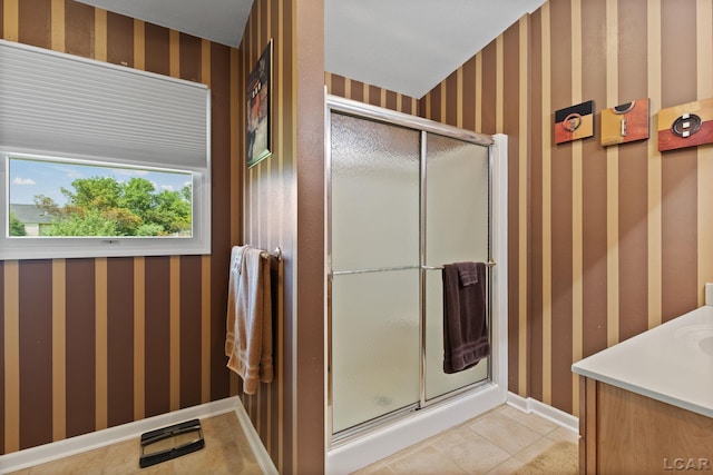 3564 Sapphire Dr, Adrian, MI 49221 - bathroom with wallpapered walls, a shower stall, vanity, and tile patterned flooring